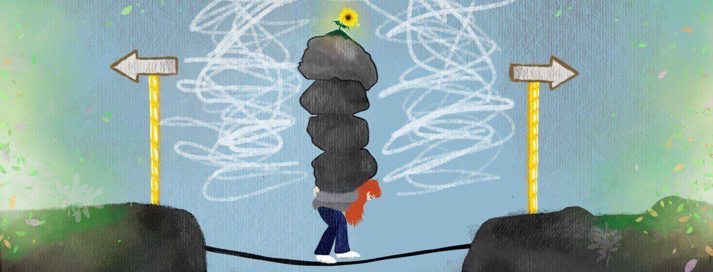 A woman crosses a tightrope as she carries a pile of boulders with a little sunflower at the top