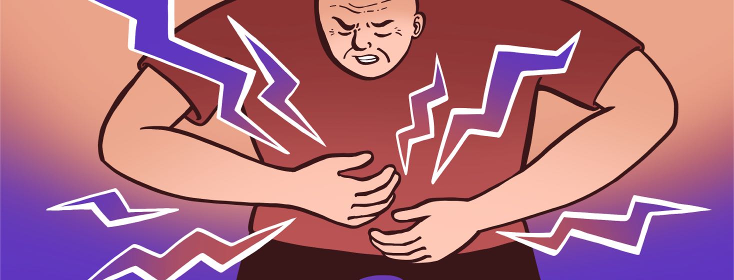 A man clutches his stomach in pain