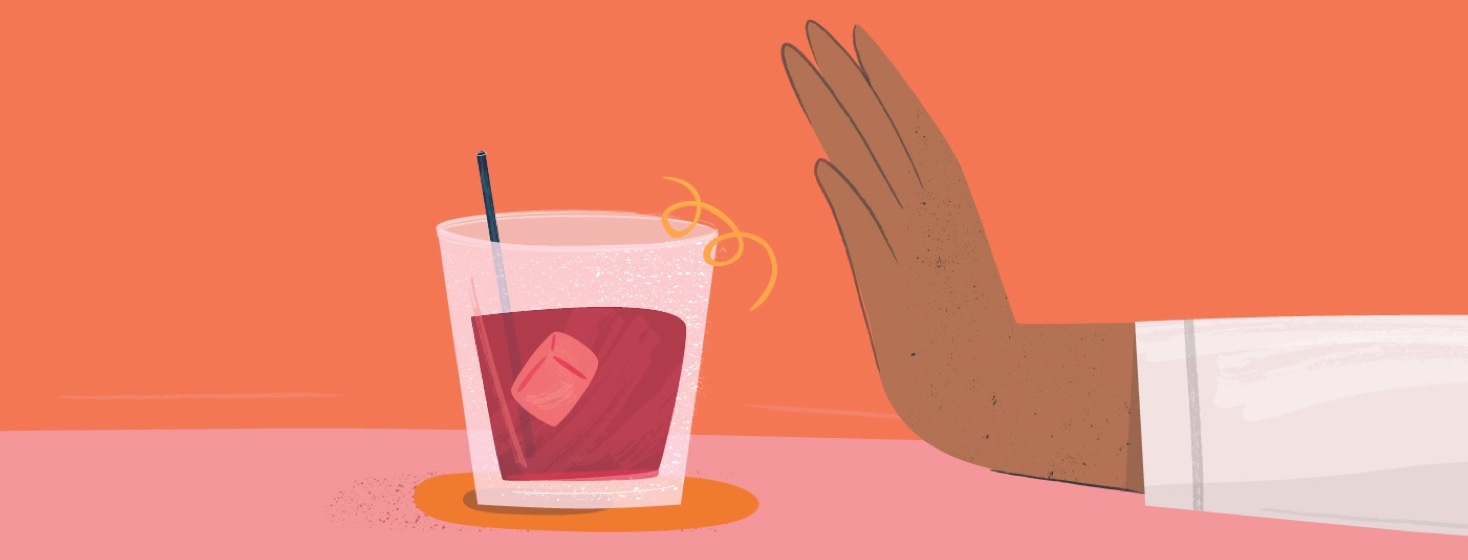 A hand gesturing no to a cocktail