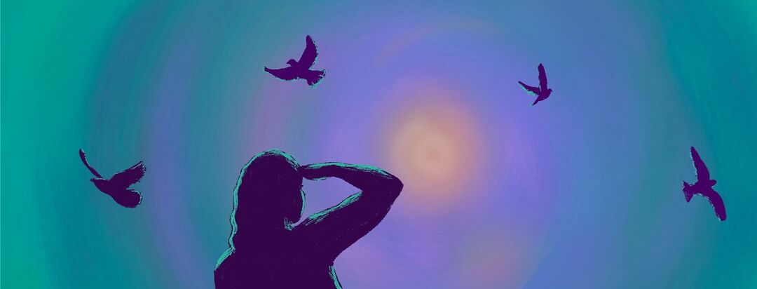 Silhouette of a woman looking at the glowing center of a sunset while shielding her eyes from the light. birds flying around